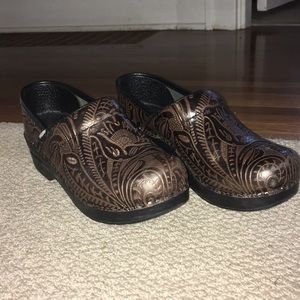 Brown patterned Dansko clogs